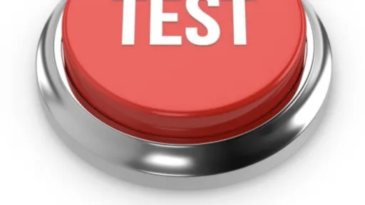 Rode knop met het woord "TEST" in witte letters